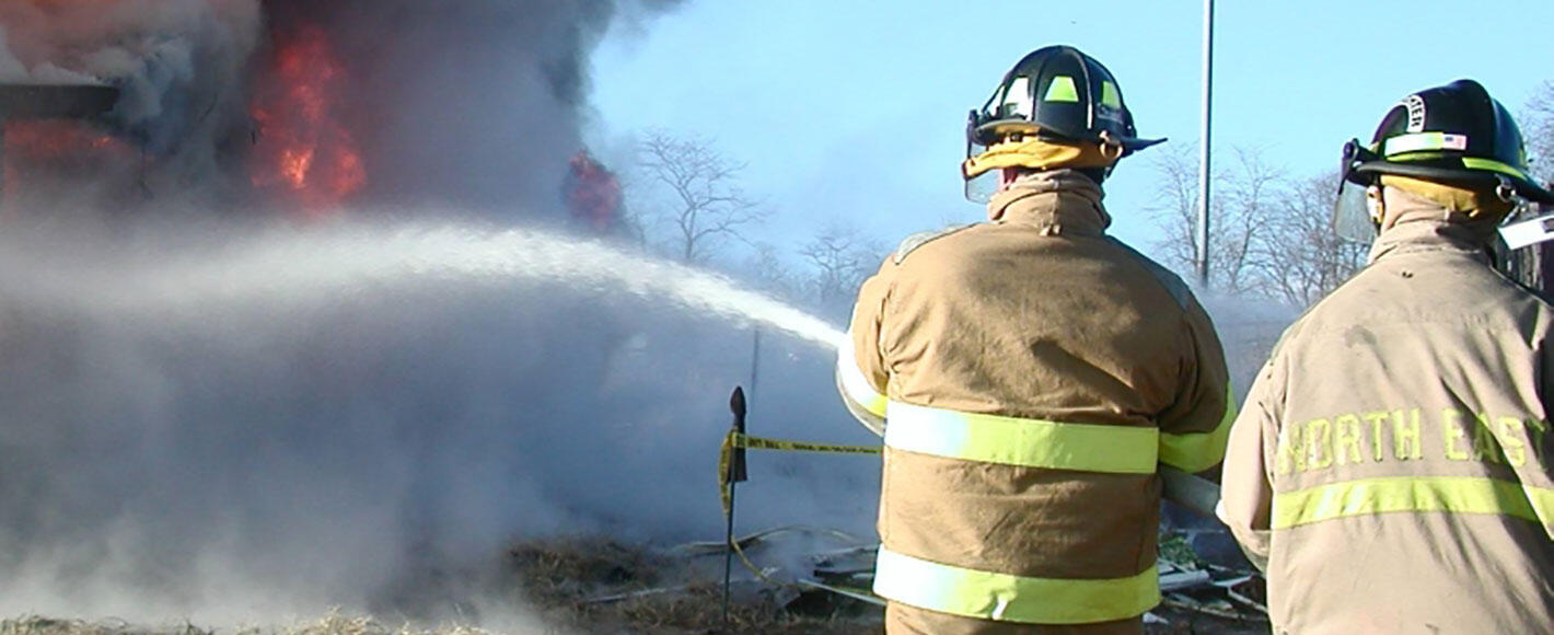 Firefighters extinguishing a fire